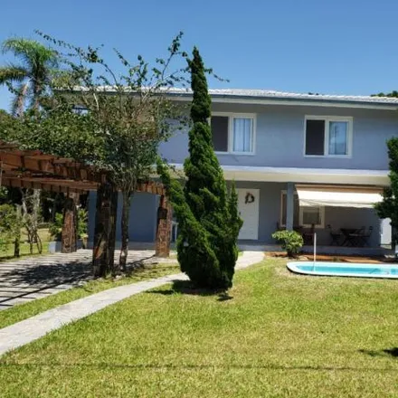 Rent this 3 bed house on Avenida Fernandes Bastos in Centro-Lagoa, Tramandaí - RS