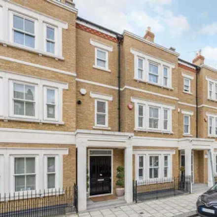 Buy this 6 bed townhouse on Warriner Gardens in London, SW11 4DU