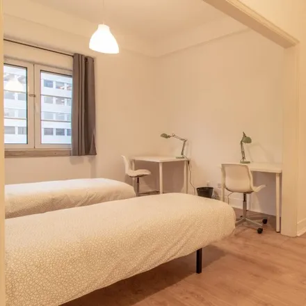 Rent this 8 bed room on Avenida da República 46 in 1050-195 Lisbon, Portugal