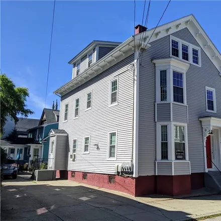 Buy this 8 bed townhouse on 89 Tobey Street in Olneyville, Providence