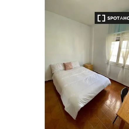 Rent this 5 bed room on Calle de Antonio López in 28026 Madrid, Spain