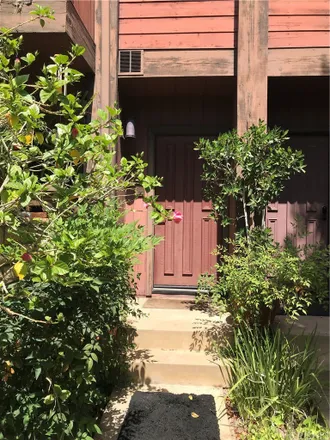 Buy this 2 bed townhouse on Green Team Construction in 21900 Burbank Boulevard, Los Angeles