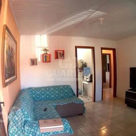 Buy this 2 bed house on Rua Xavier da Cunha in Cavalhada, Porto Alegre - RS