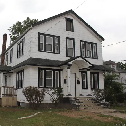 Rent this 3 bed house on 12 Jefferson Place in Village of Hempstead, NY 11550