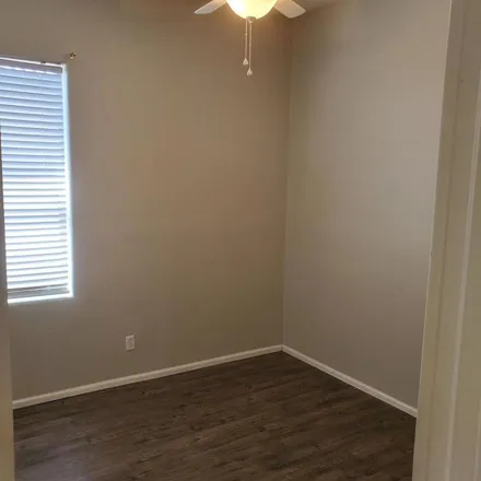 Rent this 4 bed apartment on 1507 South 171st Lane in Goodyear, AZ 85338