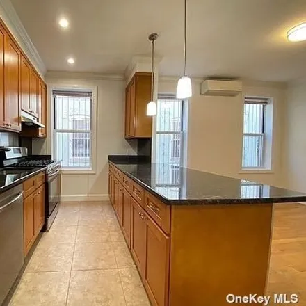 Rent this 3 bed townhouse on 21-47 35th Street in New York, NY 11105