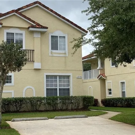 Rent this 3 bed townhouse on 1212 South Beach Circle in Kissimmee, FL 34746