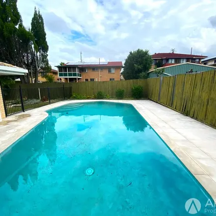 Rent this 3 bed apartment on 11 Damson Street in Macgregor QLD 4109, Australia