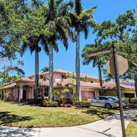 Rent this 4 bed house on 590 Pigeon Plum Way in Weston, FL 33327