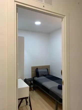 Rent this 5 bed room on Carrer de la Lluna in 28, 08001 Barcelona
