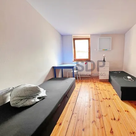 Rent this 5 bed apartment on Delikatesy Spożywcze "Konkret" in Komuny Paryskiej, 50-466 Wrocław