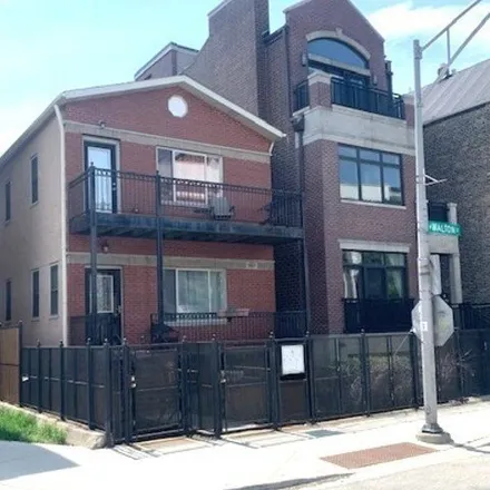 Rent this 3 bed apartment on 1327 W Walton St Apt 1 in Chicago, Illinois