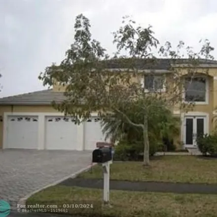 Rent this 5 bed house on 4821 Kensington Circle in Coral Springs, FL 33076