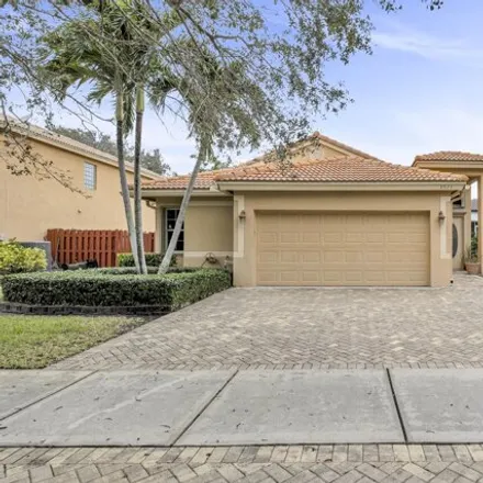 Buy this 3 bed house on 1300 Sabal Lakes Road in Delray Beach, FL 33445