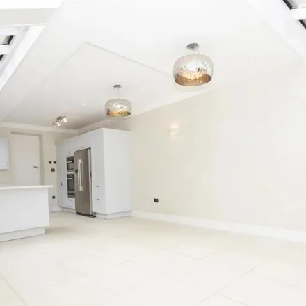 Rent this 4 bed townhouse on Sainsbury's Local in 9-11 White Hart Lane, London