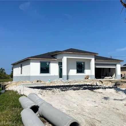 Buy this 4 bed house on 1284 Northwest 25th Place in Cape Coral, FL 33993