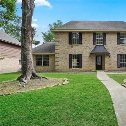 Rent this 4 bed house on 9159 Taidswood Drive in Champion Forest, TX 77379