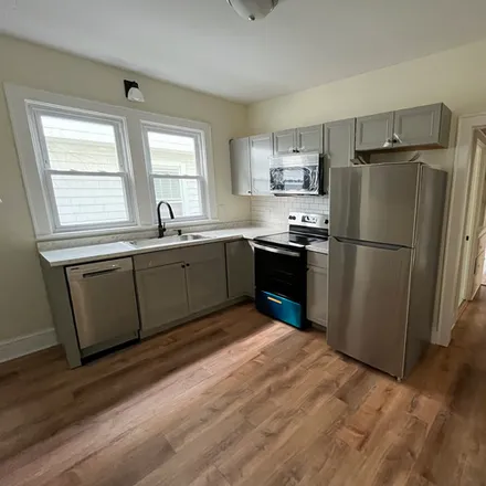 Rent this 3 bed apartment on 102 Woodlawn Avenue