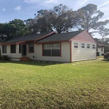 Rent this 4 bed house on 1063 Center Avenue in Holly Hill, FL 32117