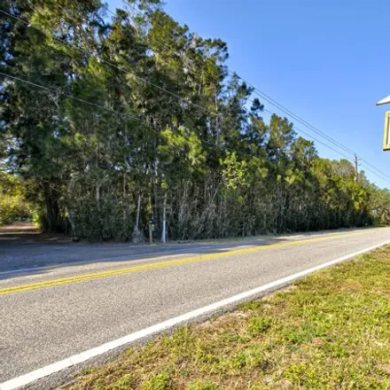 Buy this 4 bed house on 5608 South Tropical Trail in Fairyland, Brevard County