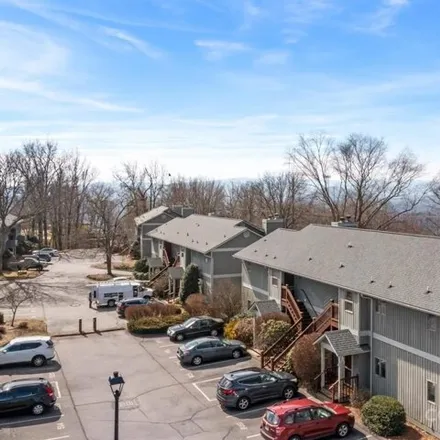 Buy this 2 bed condo on Windswept Drive in Wind Oaks Town Homes, Asheville