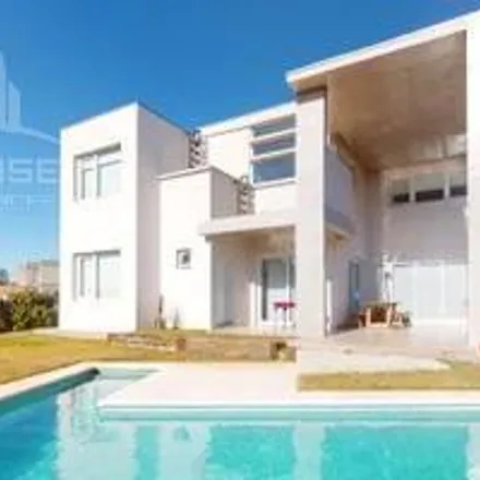 Buy this 4 bed house on unnamed road in Partido de Berazategui, 1885 Hudson