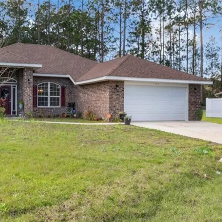 Buy this 4 bed house on 99 Kaufman Place in Palm Coast, FL 32164