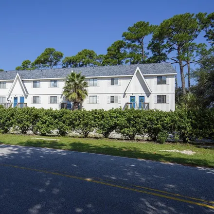 Buy this 2 bed townhouse on Lagoon East Condo in 112 West 8th Avenue, Gulf Shores