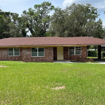 Rent this 4 bed house on 2227 Keuka Avenue in Lake County, FL 34748