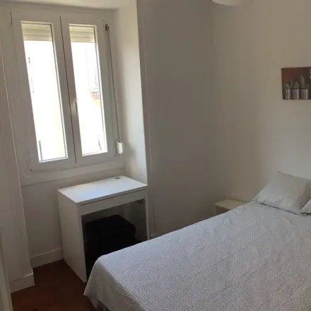 Rent this 4 bed room on We Hate F Tourists in Rua Capitão Renato Baptista, 1150-334 Lisbon
