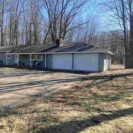 Buy this 3 bed house on 6907 Honeysette Road in Alanson, Littlefield Township