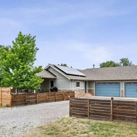 Buy this 3 bed house on 5020 Cody St in Arvada, Colorado