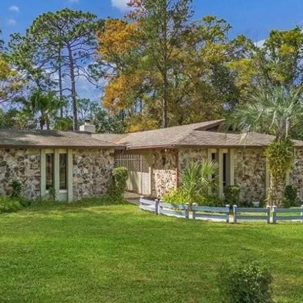 Buy this 4 bed house on 124 Springwood Circle in Seminole County, FL 32750