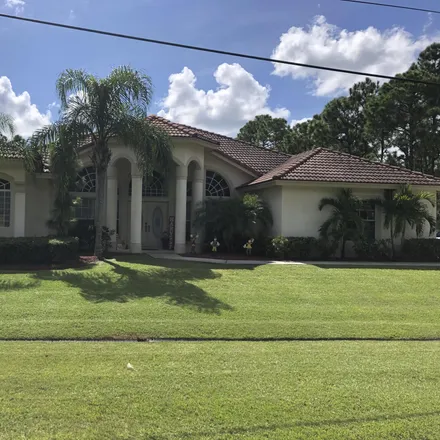 Rent this 4 bed house on 5892 Canada Street in Port Saint Lucie, FL 34986
