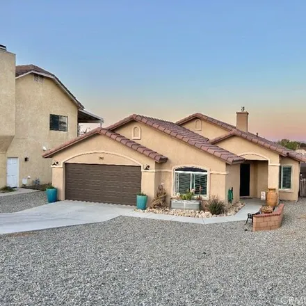 Buy this 4 bed house on 12753 Autumn Leaves Avenue in San Bernardino County, CA 92395