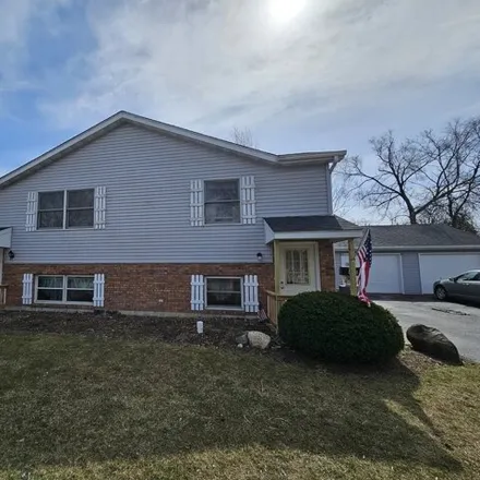 Buy this 4 bed house on 801 Rhodes Street in Woodstock, IL 60098