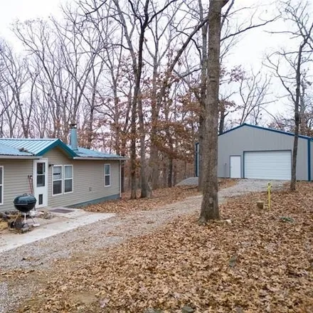 Buy this 3 bed house on 28993 Springlake Drive in Benton County, MO 65338