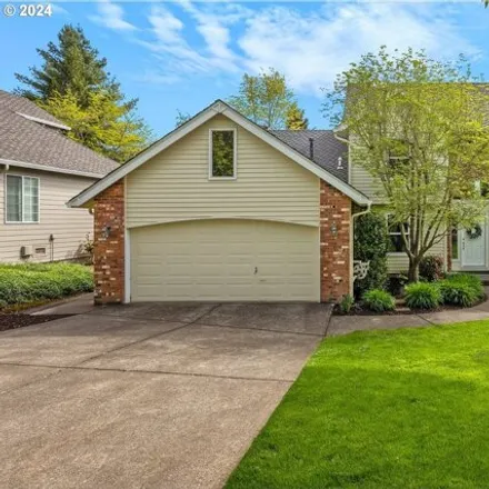 Buy this 4 bed house on 8640 Southwest Thoroughbred Place in Beaverton, OR 97008