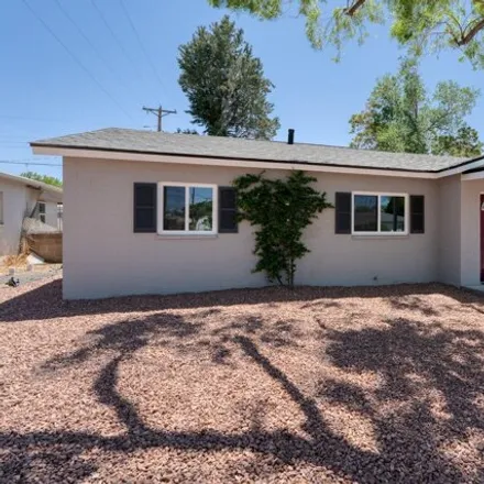 Buy this 3 bed house on 8826 Phoenix Avenue Northeast in Hoffmantown, Albuquerque