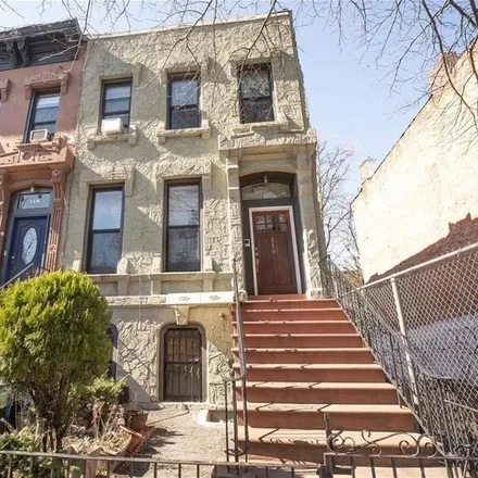 Buy this studio townhouse on 116 Malcolm X Boulevard in New York, NY 11221