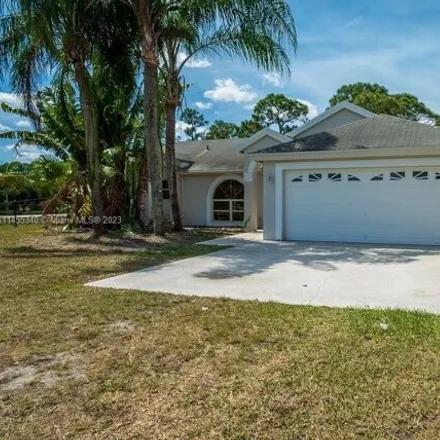 Rent this 4 bed house on 12519 82nd Street North in Palm Beach County, FL 33412