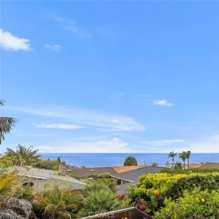 Rent this 4 bed house on 2745 Temple Hills Drive in Top of the World, Laguna Beach