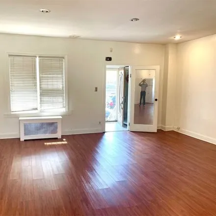 Rent this 3 bed house on 160-15 Grand Central Parkway in New York, NY 11432