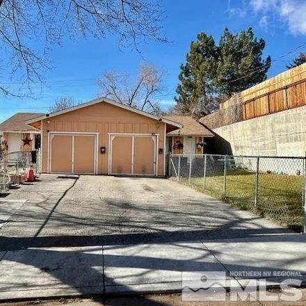 Buy this 4 bed house on 910 Cartwheel Drive in Reno, NV 89512