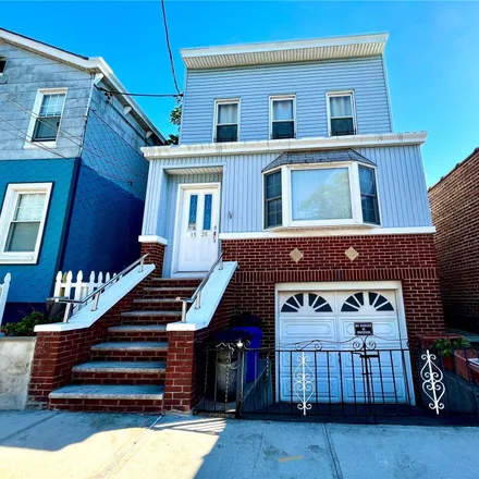 Buy this 6 bed townhouse on 15-13 124th Street in New York, NY 11356