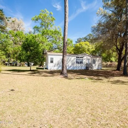 Buy this studio apartment on 6004 Horseshoe Drive in Clay County, FL 32234