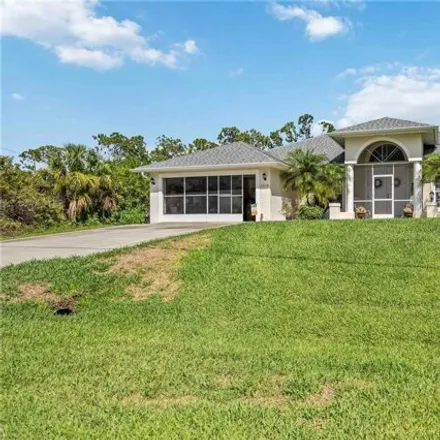 Buy this 4 bed house on 3318 Parade Ter in North Port, Florida