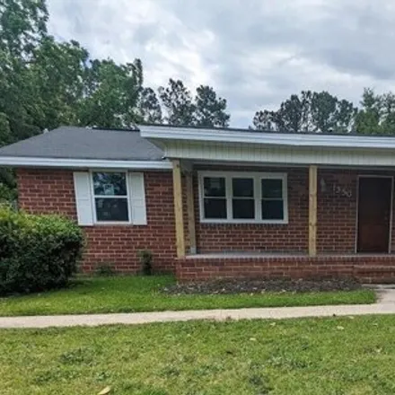 Rent this 4 bed house on 1428 Harris Street in Macon, GA 31206