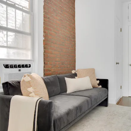 Rent this 1 bed apartment on 102 Hester Street in New York, NY 10002