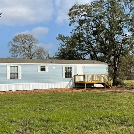 Rent this 2 bed house on 59 Country Oaks Street in Brazoria County, TX 77422